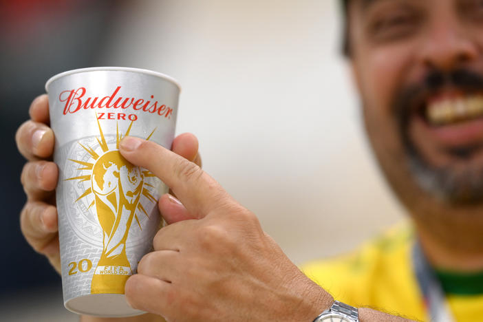 A Brazil fan points to "zero" on the Budweiser cup prior to the FIFA World Cup Qatar 2022 Group G match between Brazil and Serbia at Lusail Stadium in Lusail City, Qatar.