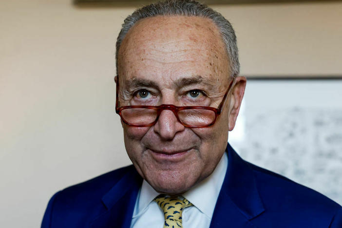 Senate Majority Leader Chuck Schumer, D-N.Y., pictured on Wednesday at the Capitol, says the Senate is moving forward with a vote on the $1.7 trillion spending package.