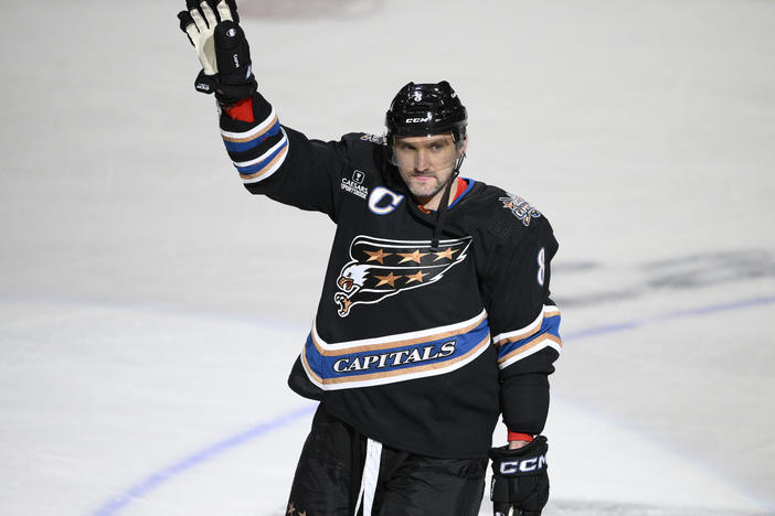Washington Capitals left wing Alex Ovechkin waves as he celebrates his third-period goal against the Winnipeg Jets on Friday in Washington. It was Ovechkin's 802nd NHL goal.