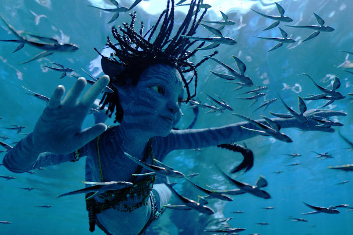 This image released by 20th Century Studios shows Trinity Bliss, as Tuk, in a scene from <em>Avatar: The Way of Water</em>.