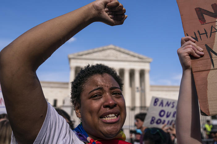 Abortion rights activist Sierra Frey cries while protesting in front of the U.S. Supreme Court on June 26, after the court overturned a federal right to an abortion. The landmark decision was one of the top political stories of 2022.