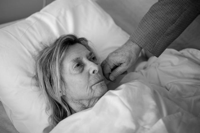 Audrey Grinker receives a visit from her doctor after friends found her on the floor of her apartment, she had mixed up her medications and became very ill. She was acting out in the hospital, trying to escape, sitting on the floor near the nurses' station, and walking into other patient's rooms. Aventura Hospital, Miami, Fla., March, 2017.