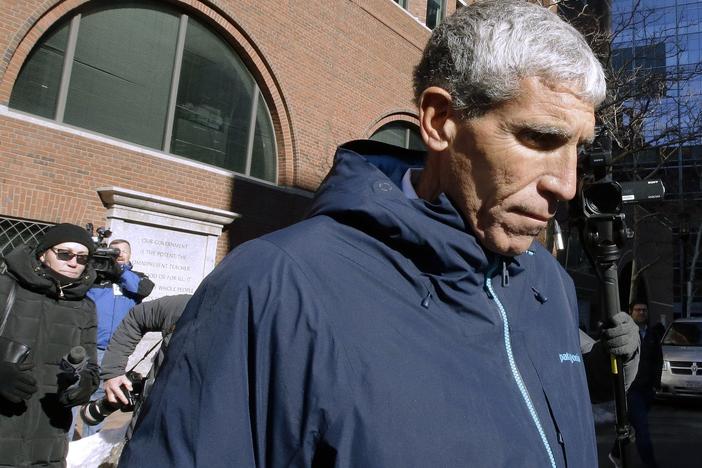 Rick Singer departs federal court in Boston in March 2019 after pleading guilty to charges in a nationwide college admissions bribery scandal. Singer is scheduled to be sentenced Wednesday afternoon in Boston.
