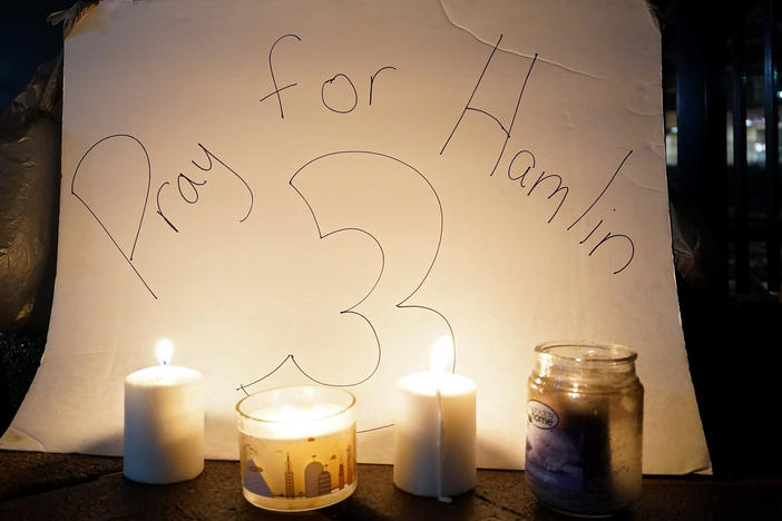 A vigil is displayed at the University of Cincinnati Medical Center for football player Damar Hamlin of the Buffalo Bills after he collapsed following a tackle during the game against the Cincinnati Bengals and was transported by ambulance to the hospital on Jan. 3, 2023 in Cincinnati, Ohio.