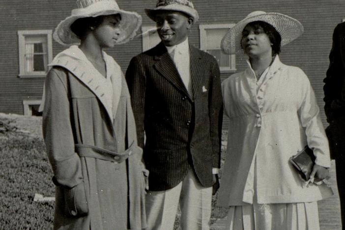 Two couples stand on a walkway at the Bruce's Beach resort in Manhattan Beach, Calif., circa 1920. A few years later, the city condemned the property and seized it from its Black owners.
