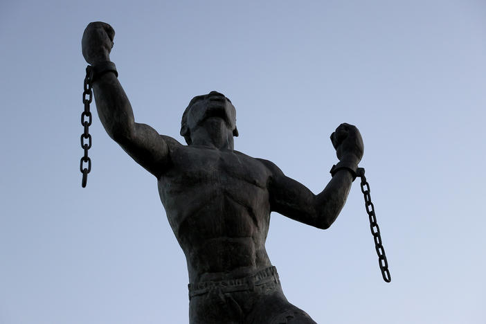 The Emancipation Statue symbolizing the breaking of the chains of slavery at the moment of emancipation is shown on November 16, 2021 in Bridgetown, Barbados.