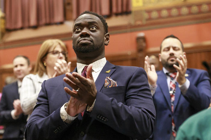 State Rep. Quentin Williams, D-Middletown, applauds during Connecticut Gov. Ned Lamont's state of the state address, Wednesday, Jan. 4, 2023, in Hartford, Conn. Williams was killed overnight in a wrong-way highway crash after having attended the governor's inaugural ball hours and after having been sworn in to a third term, House Democratic leaders said Thursday.