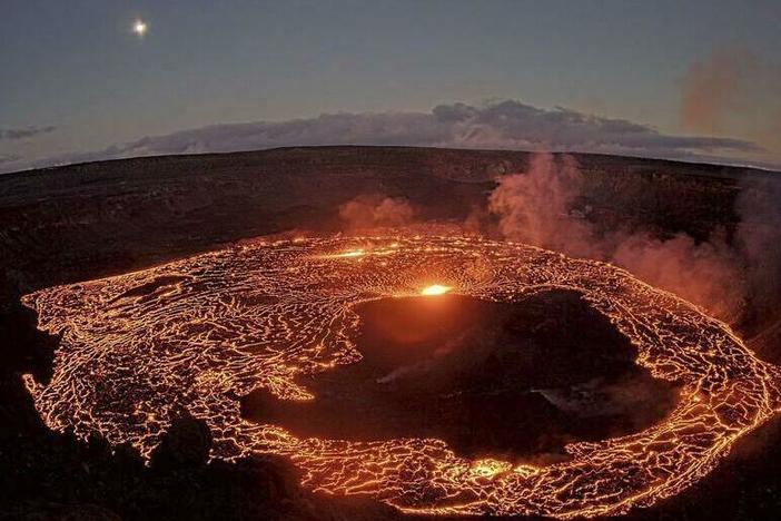 This webcam image provided by the U.S. Geological Survey shows Hawaii's Kilauea volcano, from the west rim of the summit caldera, looking east, Thursday, Jan. 5, 2023. Hawaii's Kilauea began erupting inside its summit crater Thursday, the U.S. Geological Survey said.