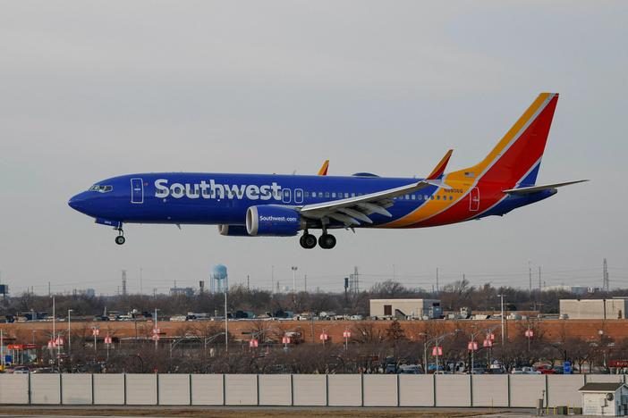 Southwest Airlines says more than 16,700 of its flights were cancelled between Dec. 21-31, which will cost the company as much as $825 million.