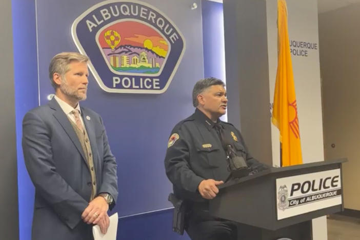 "We're worried and concerned that these are connected and possibly politically motivated or personally motivated," Albuquerque Mayor Tim Keller, left, said of a string of shootings. He's seen here alongside Police Chief Harold Medina during a press conference via the Albuquerque Police Department's Facebook livestream.