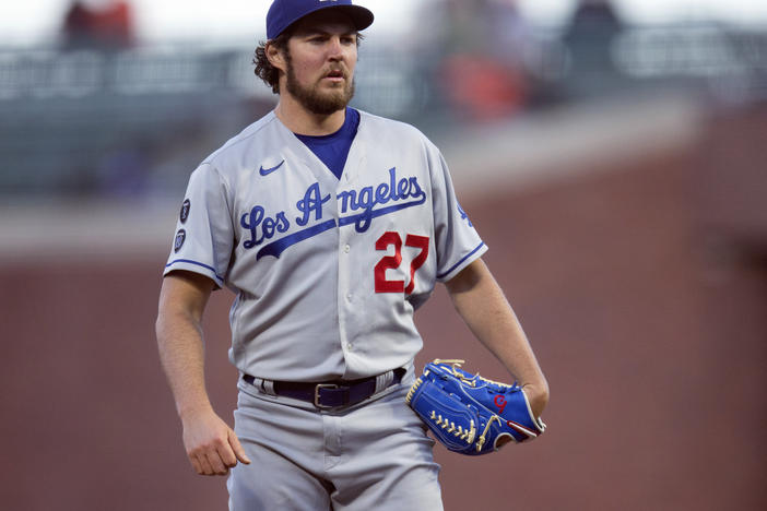 Los Angeles Dodgers starting pitcher Trevor Bauer pauses during a game against the San Francisco Giants on May 21, 2021, in San Francisco. The Dodgers are cutting ties with pitcher after his suspension was reduced two weeks ago.