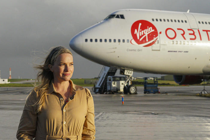 Melissa Thorpe, head of Spaceport Cornwall, in front of Cosmic Girl.