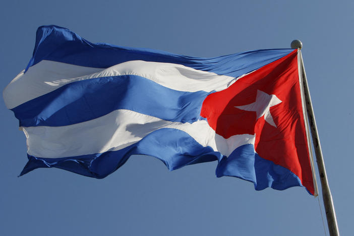A Cuban flag flutters above Revolution Square in Havana, on February 8, 2008.
