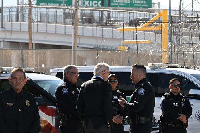 President Biden speaks with U.S. Customs and Border Protection police at the Bridge of the Americas border crossing between Mexico and the U.S. in El Paso, Texas, on Sunday.