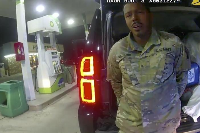 In this image made from Windsor, Va., Police video, a police officer speaks with Caron Nazario during a traffic stop, Dec. 20, 2020, in Windsor, Va.