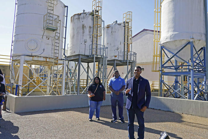 EPA Administrator Michael Regan, right, speaks to reporters in November 2021 at the O.B. Curtis Water Treatment Plant, a Ridgeland, Miss.-based facility near Jackson, Miss., about longstanding water issues that have plagued the city.