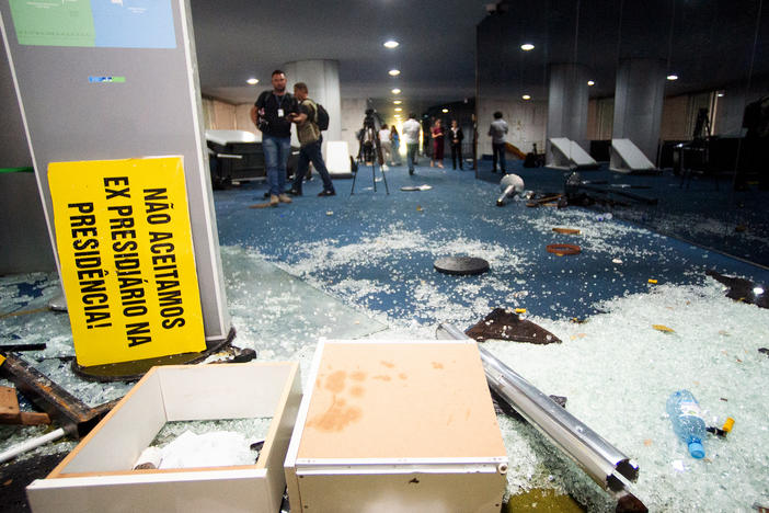 Damage is seen at Brazil's Congress one day after supporters of former President Jair Bolsonaro stormed government buildings in Brasília. The attack was planned by far-right groups on social media, according to Brazilian media and analysts.