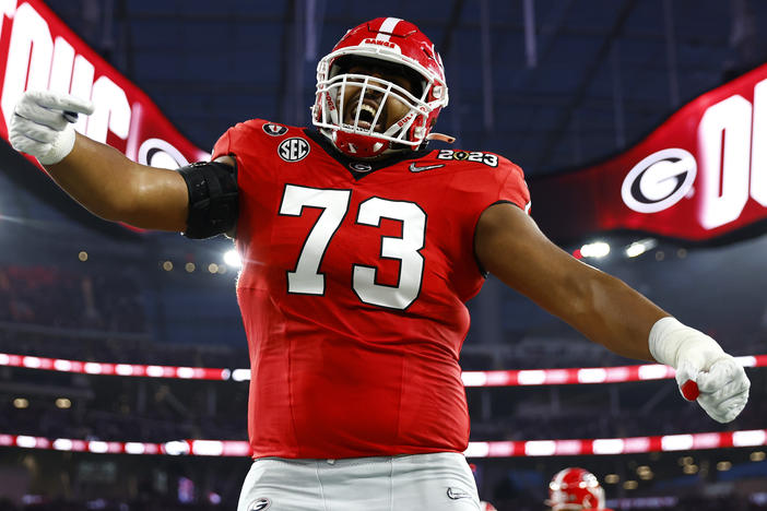 Xavier Truss of the Georgia Bulldogs celebrates with teammates after his team's first touchdown against the TCU Horned Frogs in the College Football Playoff National Championship game on Jan. 9, 2023, in Inglewood, Calif.