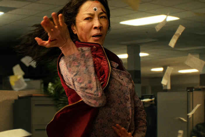 Evelyn Wang (Michelle Yeoh) is an average Chinese mother who reluctantly becomes a superhero, jumping alternate worlds and absorbing powers to fight an evil villain.