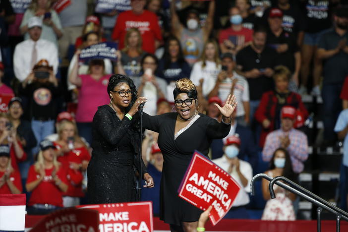 Lynnette Hardaway, left, and Rochelle Richardson, known as Diamond and Silk, speak at a Trump campaign rally in Tulsa, Okla., in June 2020.