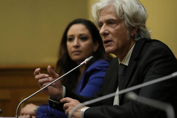 Pietro Orlandi, right, brother of Manuela, a 15-year-old daughter of a Vatican employee disappeared in 1983, is flanked by his lawyer Laura Sgro as he attends a press conference on the establishing of a parliamentary investigative commission on Manuela Orlandi and other cold cases in Rome, Tuesday, Dec. 20, 2022.