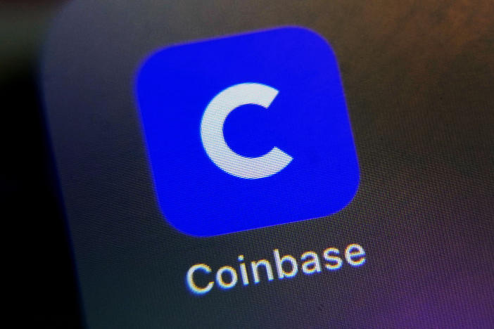 Coinbase said it would lay off about 20% of its employees.