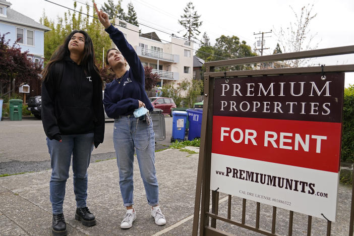 College students look for an apartment in Berkeley, Calif. Rental application fees are a barrier to many in a tight housing market. California is the latest in a string of states and cities passing laws to try and limit them.