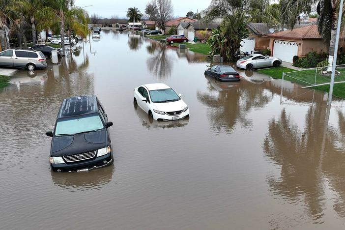 Roads and infrastructure are increasing being overwhelmed by heavier rainfall, like the California Central Valley town of Planada in January. Most states still aren't designing water systems for heavier storms.