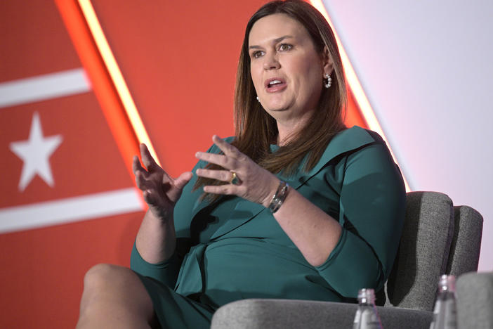 Arkansas Gov. Sarah Huckabee Sanders answers a question while taking part in a panel discussion during a Republican Governors Association conference, Wednesday, Nov. 16, 2022, in Orlando, Fla.