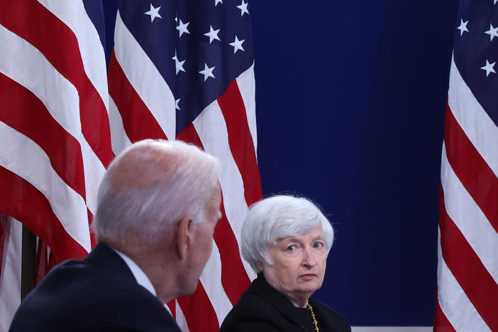 U.S. Treasury Secretary Janet Yellen listens to President Biden discuss the federal debt limit on Oct. 6, 2021, in Washington, D.C.