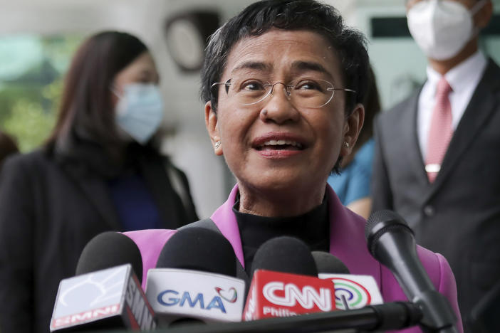 Filipino journalist Maria Ressa, one of the winners of the 2021 Nobel Peace Prize and Rappler CEO, speaks to the media after a court decision at the Court of Tax Appeals in Quezon City, Philippines. The court on Wednesday cleared Ressa and her online news company of tax evasion charges.