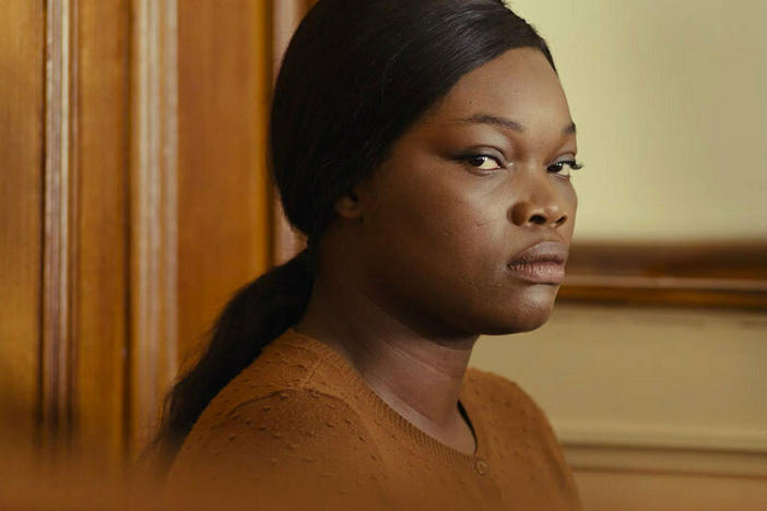 Laurence Coly (Guslagie Malanda) confesses to causing the death of her baby daughter Elise in <em>Saint Omer.</em>