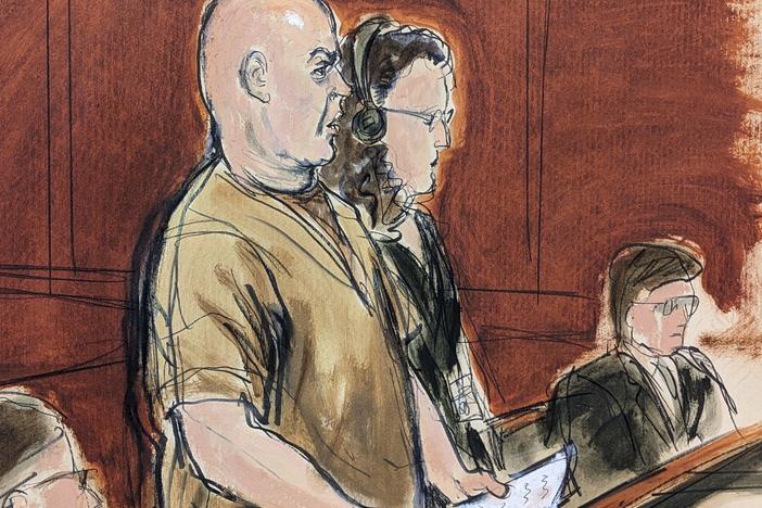 In this courtroom sketch, defendant Lawrence Ray (left) makes a statement during his sentencing in Manhattan federal court on Friday in New York, as his defense attorney, Peggy Cross-Goldenberg looks on.