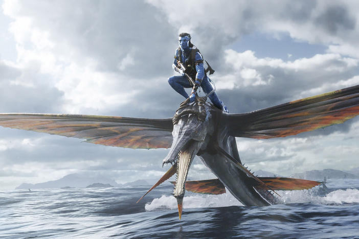 This image released by 20th Century Studios shows Jake Sully, portrayed by Sam Worthington, in "Avatar: The Way of Water."