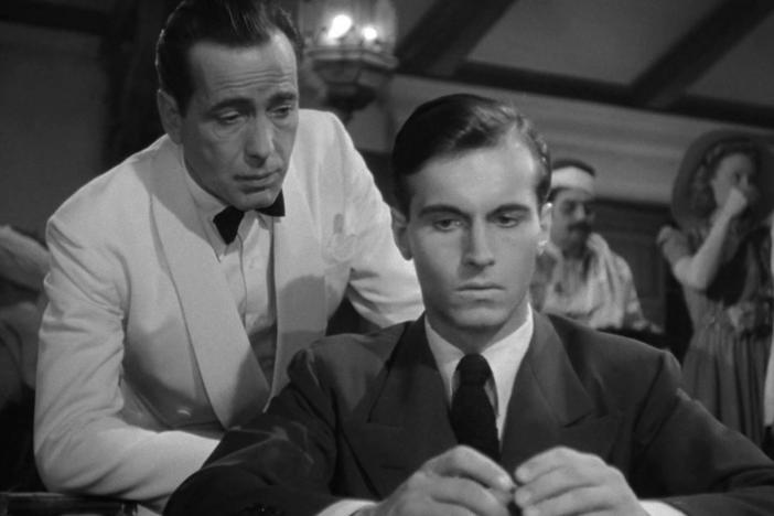 A screenshot from <em>Casablanca</em> showing Humphrey Bogart and Helmut Dantine.