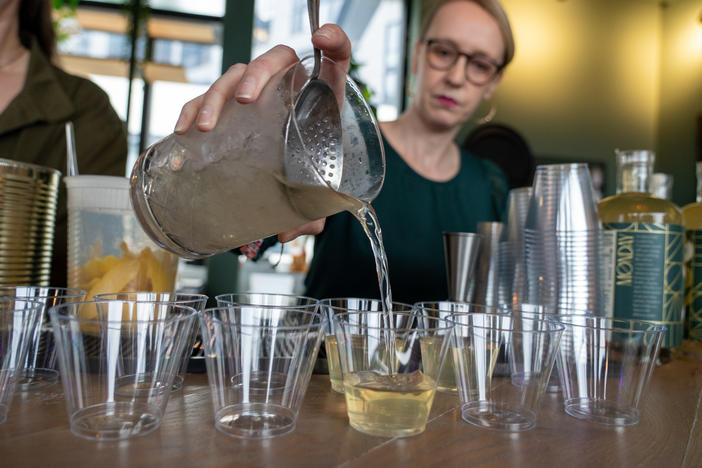 Festival volunteer Erin Petrey pours nonalcoholic martinis during bartender Derek Brown's master class at the Mindful Drinking Fest in Washington, D.C., on Jan. 21.