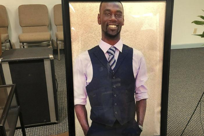 A portrait of Tyre Nichols is displayed at a memorial service for him on Jan. 17 in Memphis, Tenn. Nichols died three days after Memphis police officers beat him during a traffic stop on Jan. 7.