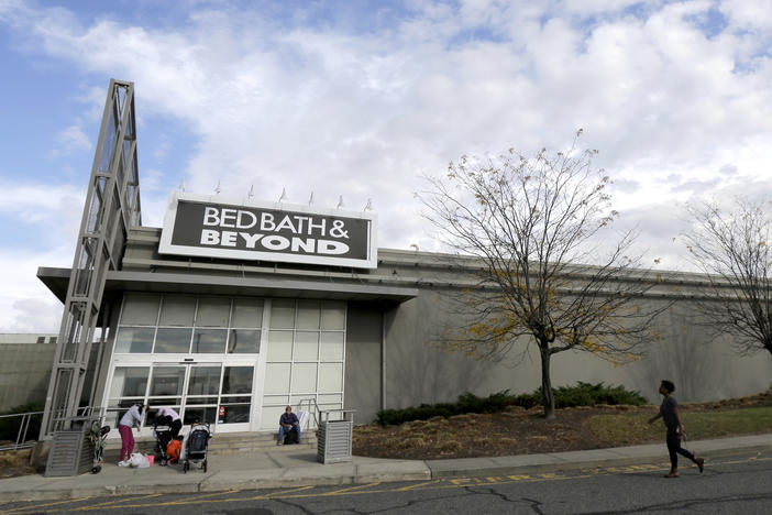 Shoppers stand outside a Bed Bath & Beyond store in New Jersey.