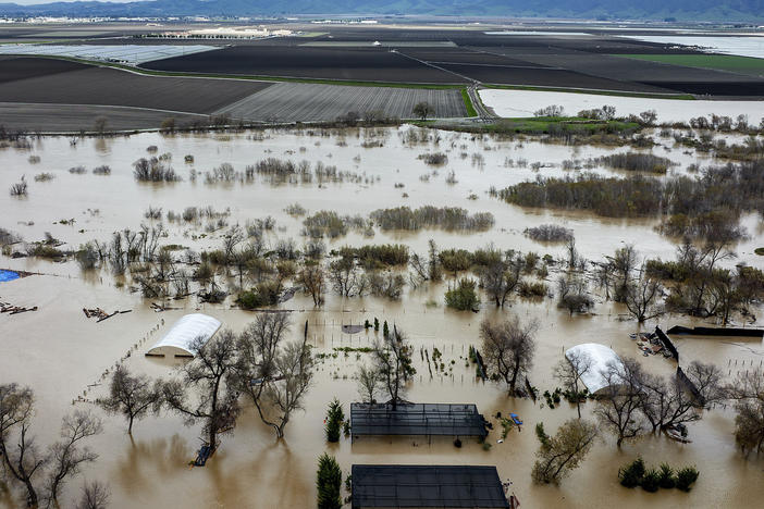 Floodwaters cover a property along River Rd. in Monterey County, Calif., as the Salinas River overflows its banks on Jan. 13, 2023.