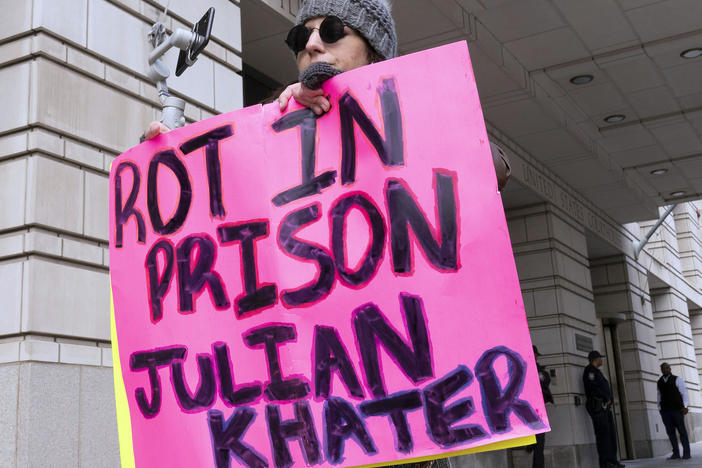 Brianne Chapman protests outside the federal courthouse in Washington, D.C., on Friday, during the sentencing hearing for Julian Khater and George Tanios. Khater pleaded guilty to assaulting Capitol Police Officer Brian Sicknick with pepper spray on Jan. 6, 2021.
