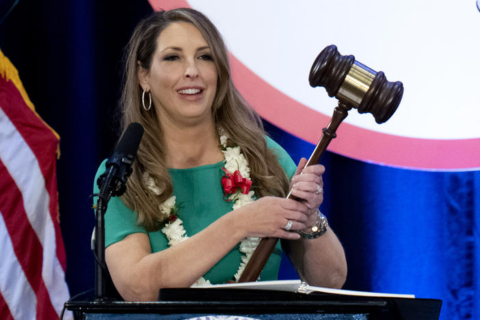 Re-elected Republican National Committee Chair Ronna McDaniel holds a gavel while speaking at the committee's winter meeting in Dana Point, Calif., on Friday.