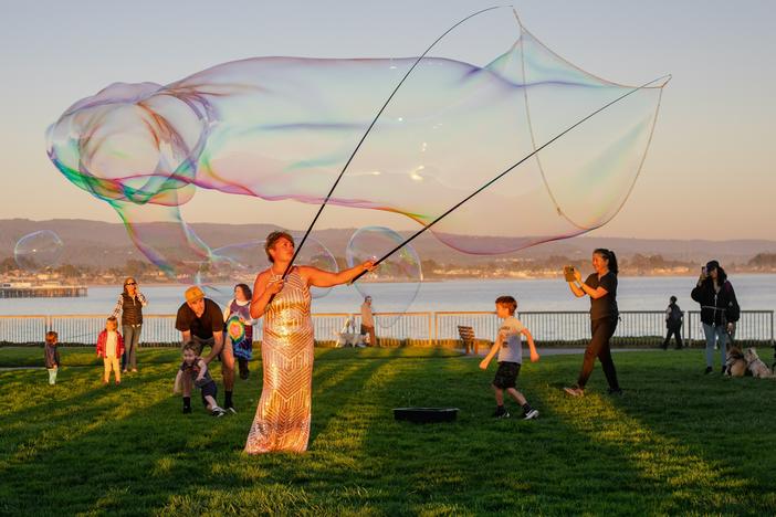 Rachel Maryam Smith fell in love with the ethereal beauty of giant soap bubbles several years ago and began creating them at sunset events in Santa Cruz, Calif. When enjoying bubbles together, "there is a euphoric point I have observed my participants reach," she says.
