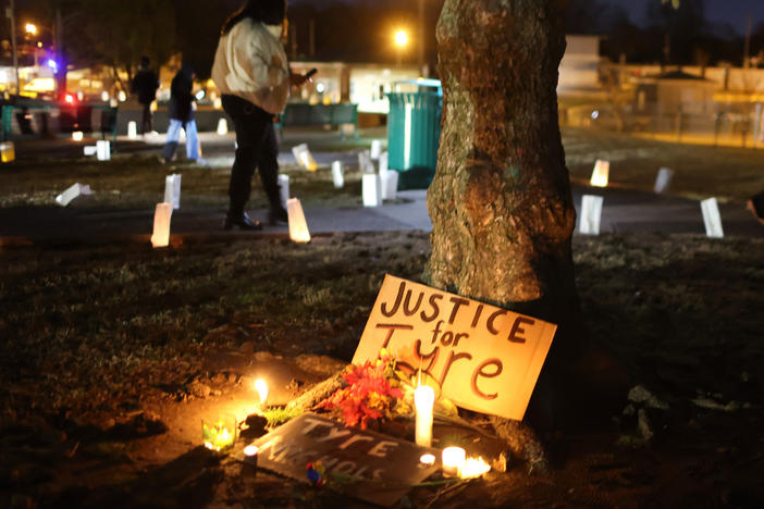 People attend a candlelight vigil in memory of Tyre Nichols on Thursday at the Tobey Skate Park in Memphis, Tenn.