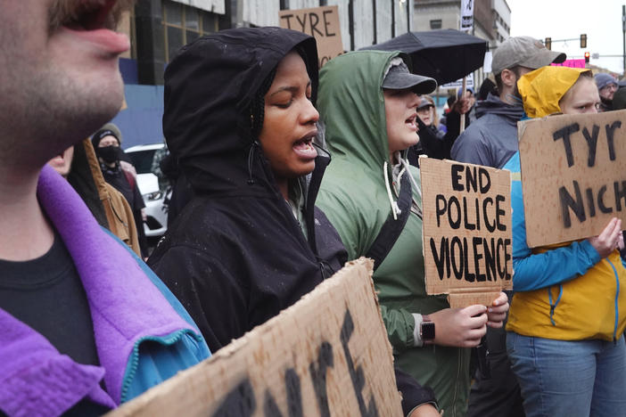 Protesters march through downtown Memphis in response to the death of Tyre Nichols earlier this month. Video footage of Nichols being arrested and beaten by police was released to the public on Friday.