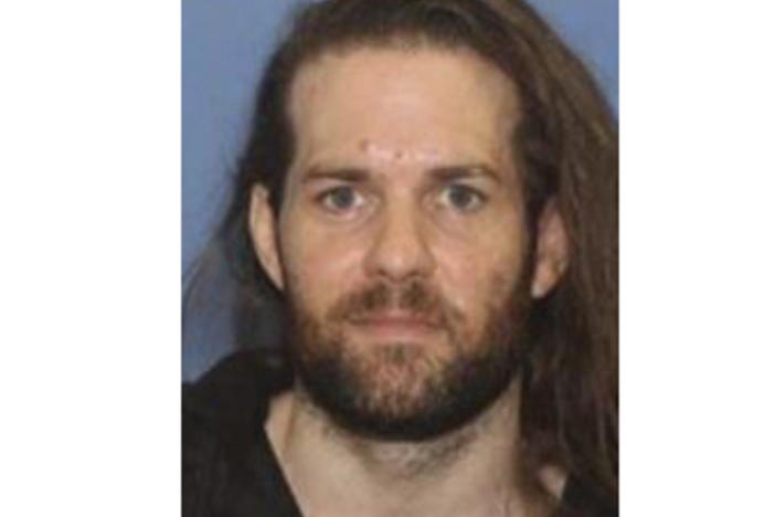 An undated photo provided by the Grants Pass Police Department shows Benjamin Obadiah Foster, who is wanted by authorities for attempted murder, kidnapping and assault.