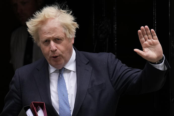 Former Prime Minister Boris Johnson (shown here in May 2022) has said that President Vladimir Putin didn't seem serious about avoiding war in the days before Russia invaded Ukraine. In a new documentary released on Monday, he says that at one point Putin told the British leader it would be easy to kill him with a missile.