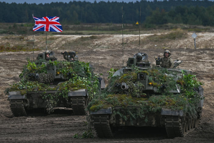 British Army Challenger 2 tanks are seen at a training ground in Poland on Sept. 21, 2022. This week, Ukrainian soldiers have arrived in the United Kingdom for training on the Challenger 2.