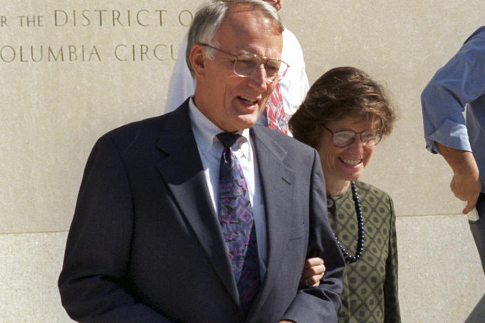 Former Minnesota Sen. David Durenberger and his then-fiancée Susan Foote leave federal court in Washington on Aug. 22, 1995. Durenberger, a Republican who espoused a progressive brand of politics and criticized the GOP after his political career, died Tuesday at age 88.