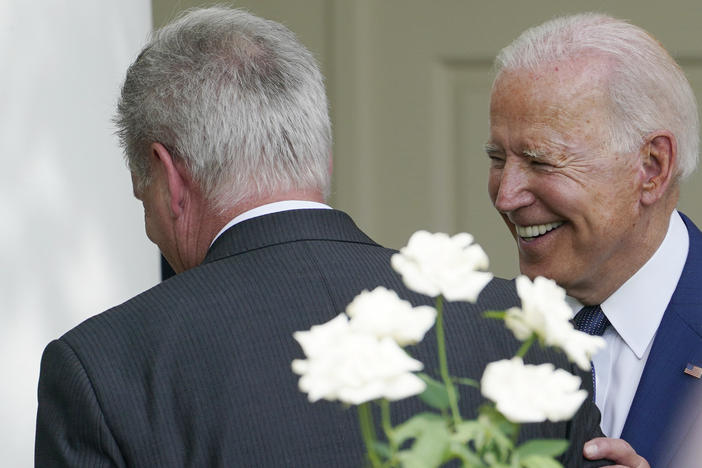 President Biden talks with Rep. Kevin McCarthy, R-Calif., after an event in the White House Rose Garden on July 26, 2021. The president and the House speaker are preparing for their first official visit at the White House on Wednesday, ahead of a looming debt crisis.