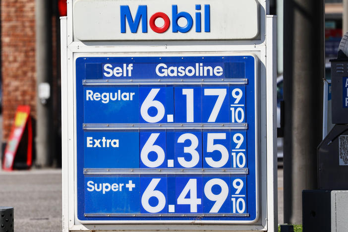 Gas prices are displayed at a Mobil gas station in Los Angeles on Oct. 28, 2022. ExxonMobil posted record earnings in 2022, benefitting from a surge in oil prices.
